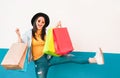 Crazy fashion Asian girl doing shopping in mall center - Happy Chinese woman having fun buying new clothes Royalty Free Stock Photo