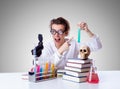 Crazy female chemist in lab Royalty Free Stock Photo