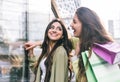 Crazy girls making shopping Royalty Free Stock Photo