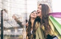 Crazy girls making shopping Royalty Free Stock Photo