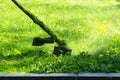 Crazy grass cutting in the park Royalty Free Stock Photo