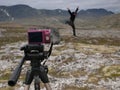 Crazy guy taking a jumping selfie Royalty Free Stock Photo