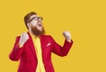 Crazy happy stylish bearded chubby man laughing out loud rejoicing in his success. Royalty Free Stock Photo