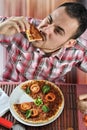 Crazy hungry man eating pizza Royalty Free Stock Photo