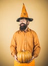 The crazy joker face. Halloween man with pumpkin - Holidays celebration concept. Thanksgiving seasonal cooking Royalty Free Stock Photo