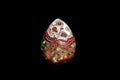 Crazy lace agate pear cabochon. Black background. Royalty Free Stock Photo