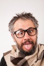 Crazy looking old man with grey beard with nerd big glasses Royalty Free Stock Photo