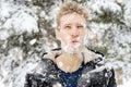 Crazy mad bearded man frost face covered by snow, emotional face portrait, winter season f Royalty Free Stock Photo