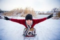 Crazy man enjoy a sleigh ride. Man sledding Royalty Free Stock Photo