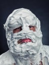 Crazy man with face completely in shaving foam Royalty Free Stock Photo