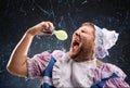 Crazy man sucking a pacifier Royalty Free Stock Photo