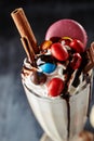 Crazy Milkshake with Chocolate Treats, Macaroons and Colorful Sw Royalty Free Stock Photo