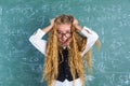 Crazy nerd blond student girl hold hair surprised Royalty Free Stock Photo