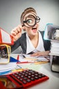 Crazy office lady at desk. Royalty Free Stock Photo
