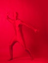 Crazy red man on a red background, figure in a leotard.