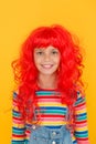 Crazy redhead wig. Messy hairstyle. Kid cheerful smiling happy redhead girl. I am ginger and proud of it. Redhead