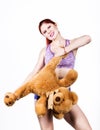 Crazy redhead young woman tears off a bears legs