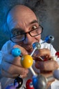 Crazy scientist with model molecules