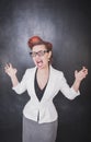 Crazy screaming teacher on chalkboard background Royalty Free Stock Photo