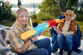 Crazy Senior couple.Senior couple on  vacation  playing with water gun Royalty Free Stock Photo