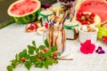 Crazy shake on top with marshmallow, waffles, biscuits and sweets on a bright colored background Royalty Free Stock Photo