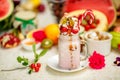 Crazy shake on top with a strawberry marmalade and candy and marmalade bears on a bright colored background