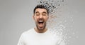 Crazy shouting man in t-shirt over gray background Royalty Free Stock Photo