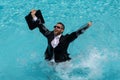 Crazy summer business. Fun business lifestyle. Handsome business man in suit using laptop in swimming pool. Funny Royalty Free Stock Photo