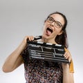 Crazy woman with a clapboard Royalty Free Stock Photo