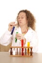 Crazy woman scientist with test tubes scrunch face Royalty Free Stock Photo