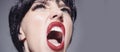 Crazy woman screaming and shouting. Shout and scream mouth. Close up screaming face. Royalty Free Stock Photo