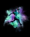 Creaive collage. American football player in motion, catching ball isolated over colorful powder explosion on black Royalty Free Stock Photo