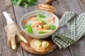 Cream of asparagus soup with prawns Royalty Free Stock Photo