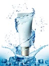 Cream bottle mock up in water splash on blue background. Royalty Free Stock Photo