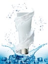 Cream bottle mock up in water splash on blue background.