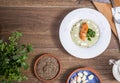 Cream of broccoli soup with salmon top view a wooden background Royalty Free Stock Photo