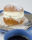 Cream bun with almond paste and coffee Royalty Free Stock Photo