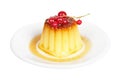 Cream caramel dessert with red currants