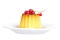 Cream caramel dessert with red currants Royalty Free Stock Photo