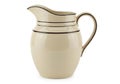 Cream ceramic pitcher with dark rim and handle on white Royalty Free Stock Photo