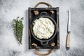 Cream cheese Mascarpone in a wooden tray for tiramisu. White background. Top view