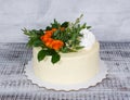 Cream cheese vanilla wedding cake with orange roses Royalty Free Stock Photo