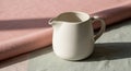 Cream-colored ceramic jug with a rounded Royalty Free Stock Photo