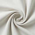 Cream-colored fabric swirled into a central spiral pattern. The texture is smooth, with Royalty Free Stock Photo