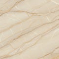 Cream-colored marble with subtle color variations and organic veining patterns. The Royalty Free Stock Photo
