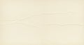 Cream-colored paper texture with subtle horizontal creases. The surface appears slig Royalty Free Stock Photo