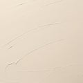 Cream-colored textured surface with sweeping, smooth brush strokes creating subtle Royalty Free Stock Photo