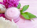 Cream cosmetic bloom peony moisturizing spring aromatherapy flower wooden background