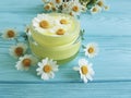 Cream Cosmetic Daisy Chamomile Product Protection Freshness Extract On A Blue Wooden Background