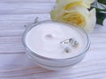 Cream cosmetic softening sensitive flower wellness on wooden background ointment